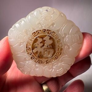 Carved Jade Pendant with Gold Accents